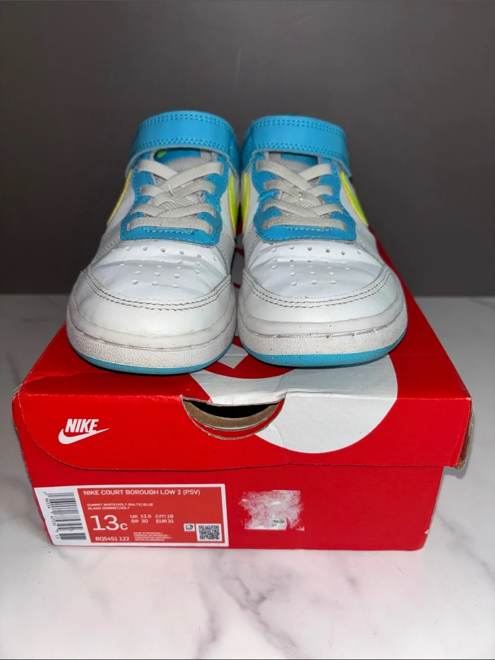 Nike Kids White Sneakers with Neon Yellow Swoosh & Light Blue Trim